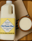 Goat milk bottle & milk in bowl